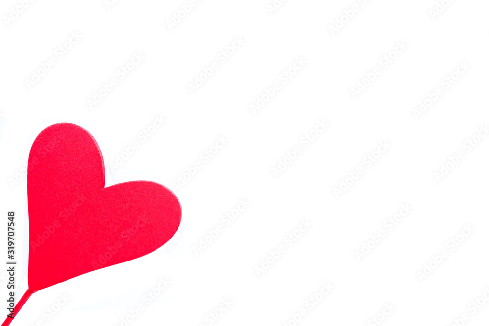 Obraz premium Red heart on a white background. To celebrate Valentine's Day