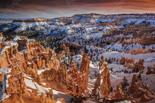Sunset on Bryce Canyon National Park in Winter covered with snow