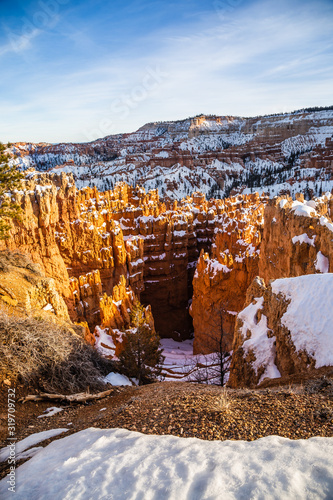 Cliffs of Bryce Canyon National Park covered with snow during Winter 