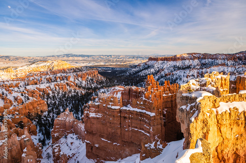 Sunset on Inspiration Point in Bryce Canyon National Park in Winter covered with snow