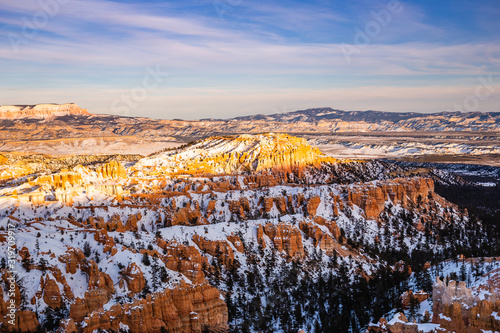 Sunset on Inspiration Point in Bryce Canyon National Park in Winter covered with snow