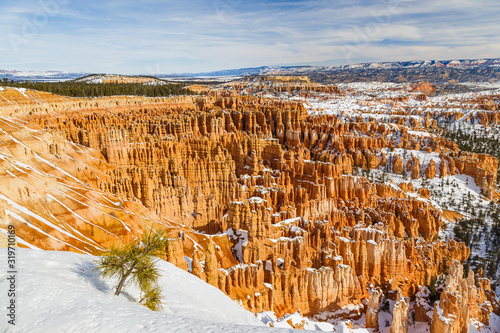Amphitheater of Bryce Canyon National Park in winter covered with snow seen from Inspiration Point