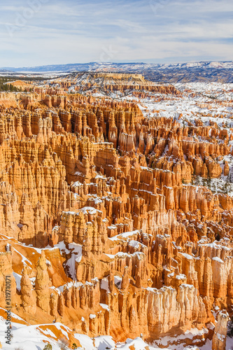 View of the Bryce Canyon amphitheater during winter covered with snow seen from Inspiration Point