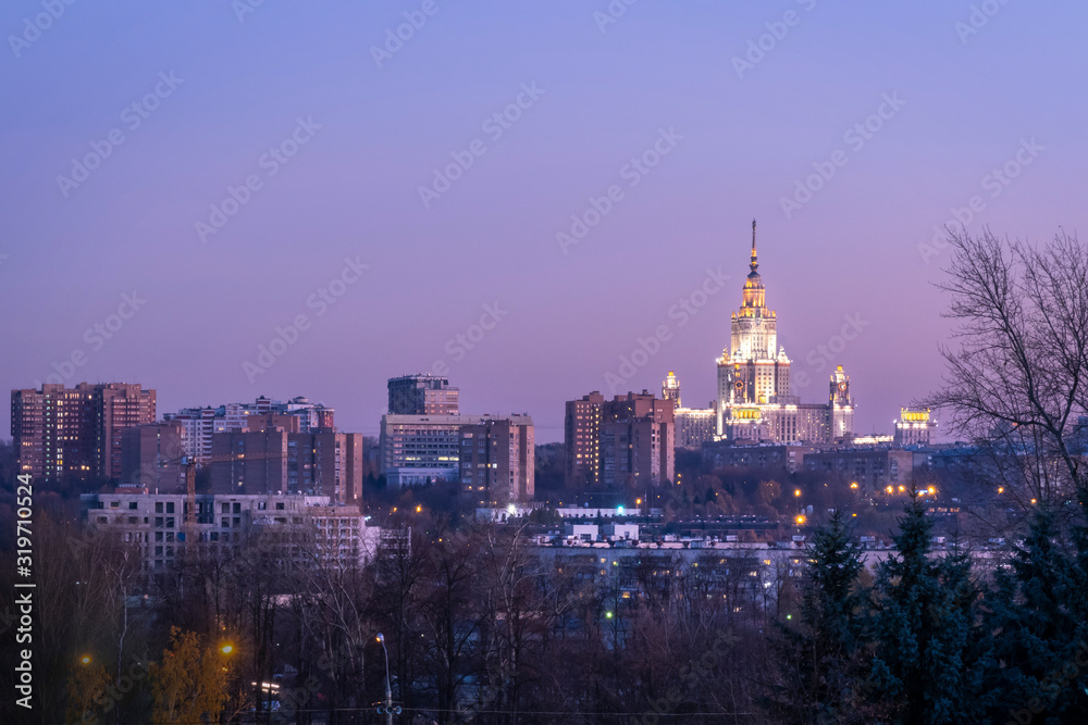 Moscow view with Moscow State University (MSU) and surrounding buildings at night