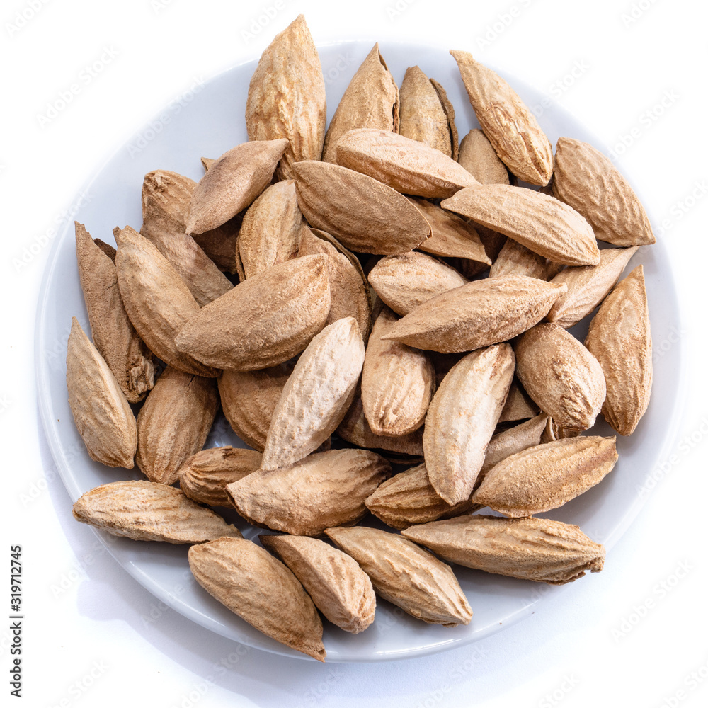 Migdal on a white isolated background. Food nuts for your website design. Theme of cooking and cooking Migdal on a white isolated background. Food nuts for your website design. Theme of cooking and cooking