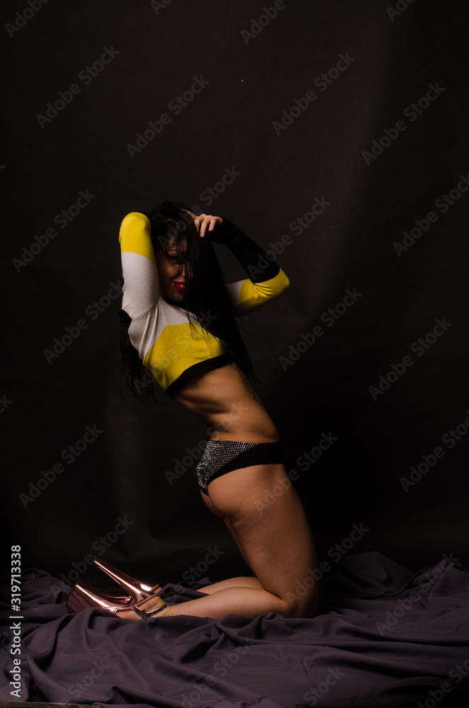 Young beautiful woman in a fashionable linen luxury brunette in the Studio.