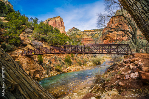 Wooden bridge and scenery in Zion National Park during winter photo