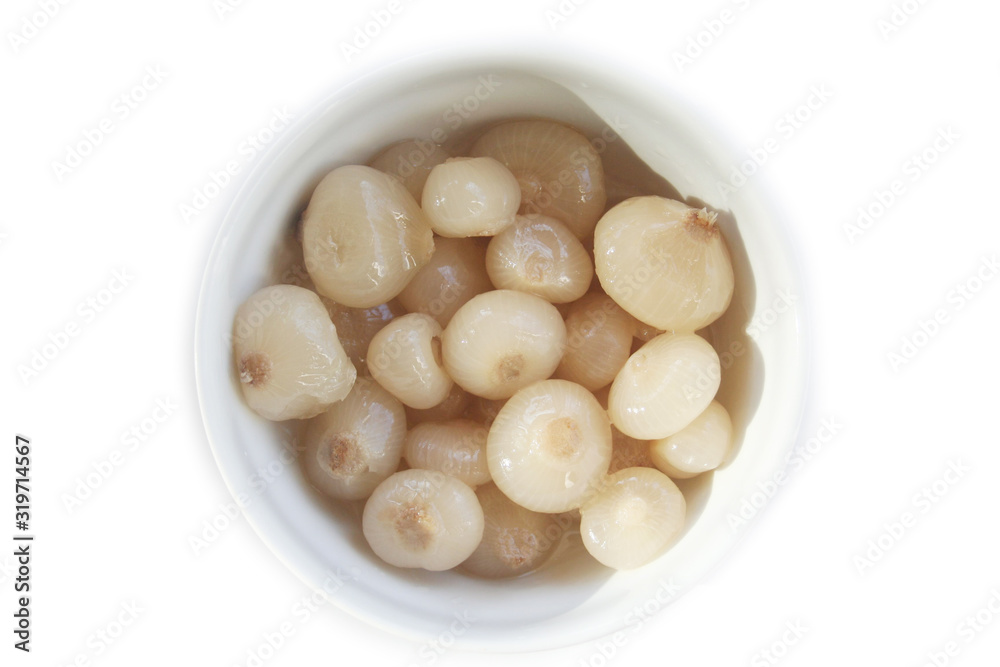 Pickled little pearl onions in a bowl isolated on white background Pickled little pearl onions in a bowl isolated on white background