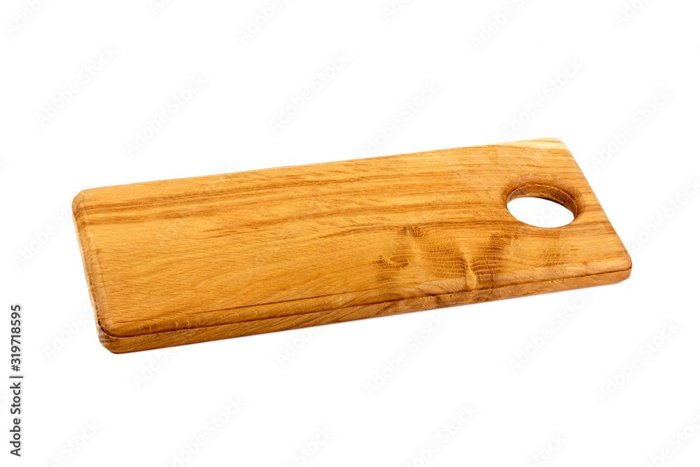 wooden oak cutting Board with a hole isolated on a white background close up wooden oak cutting Board with a hole isolated on a white background close up