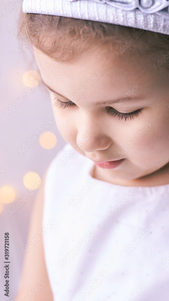 Little cute girl sale portrait. Photography of luxury female child. Happy winner emotion. Fresh person face. Kid eyes Little cute girl sale portrait. Photography of luxury female child. Happy winner emotion. Fresh person face. Kid eyes