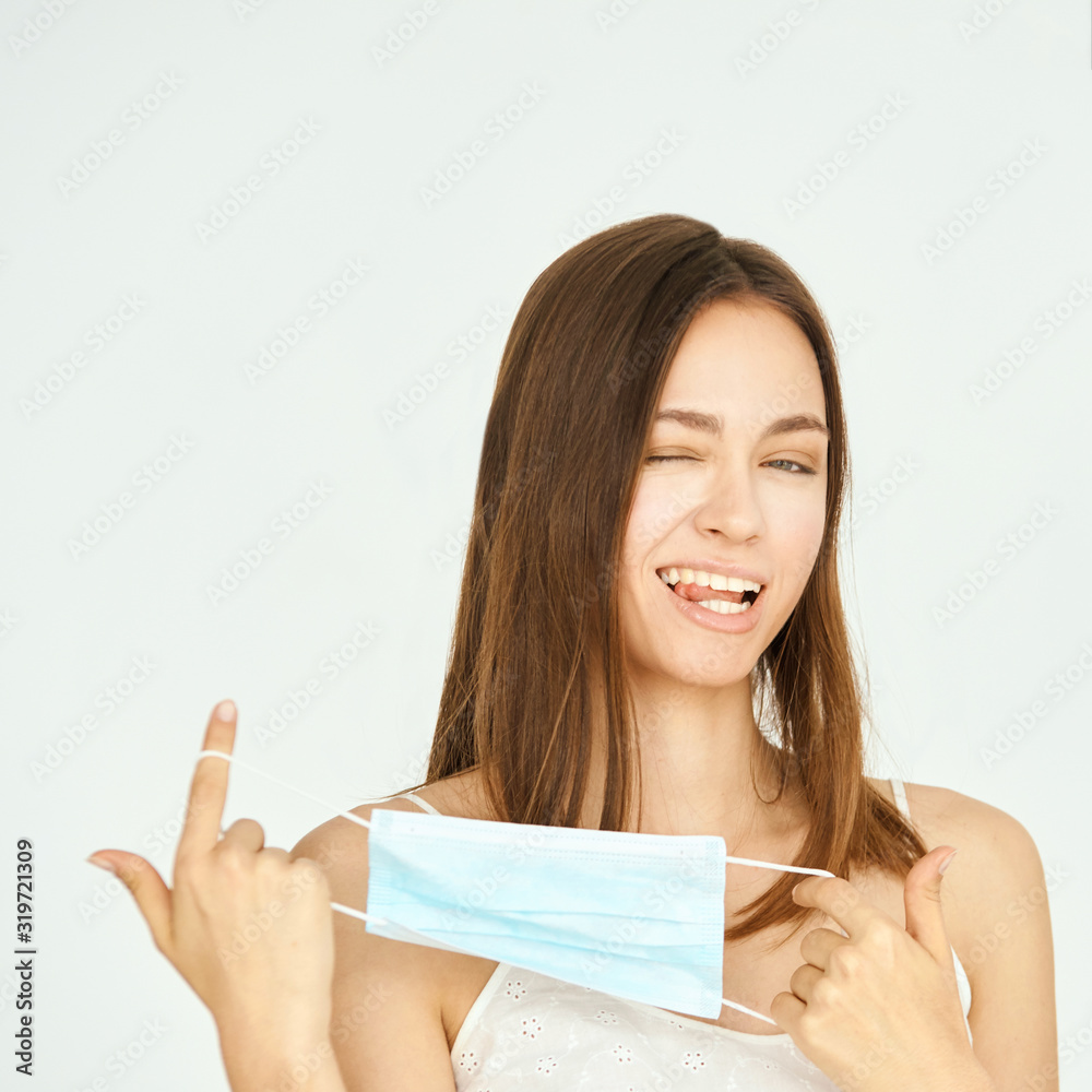Pretty young woman with protective mask. Virus protection equipment. Anti smog person medic respiratory. Medical pollution. Coronavirus sick Pretty young woman with protective mask. Virus protection equipment. Anti smog person medic respiratory. Medical pollution. Coronavirus sick