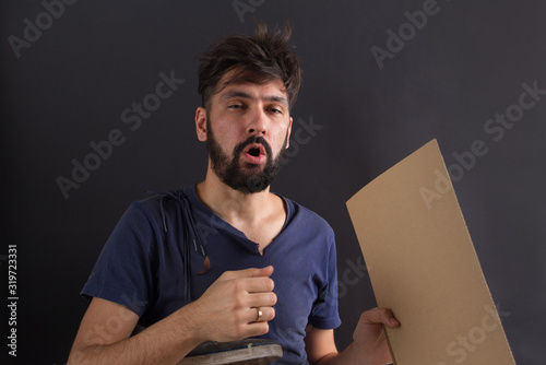homeless tramp with a sign