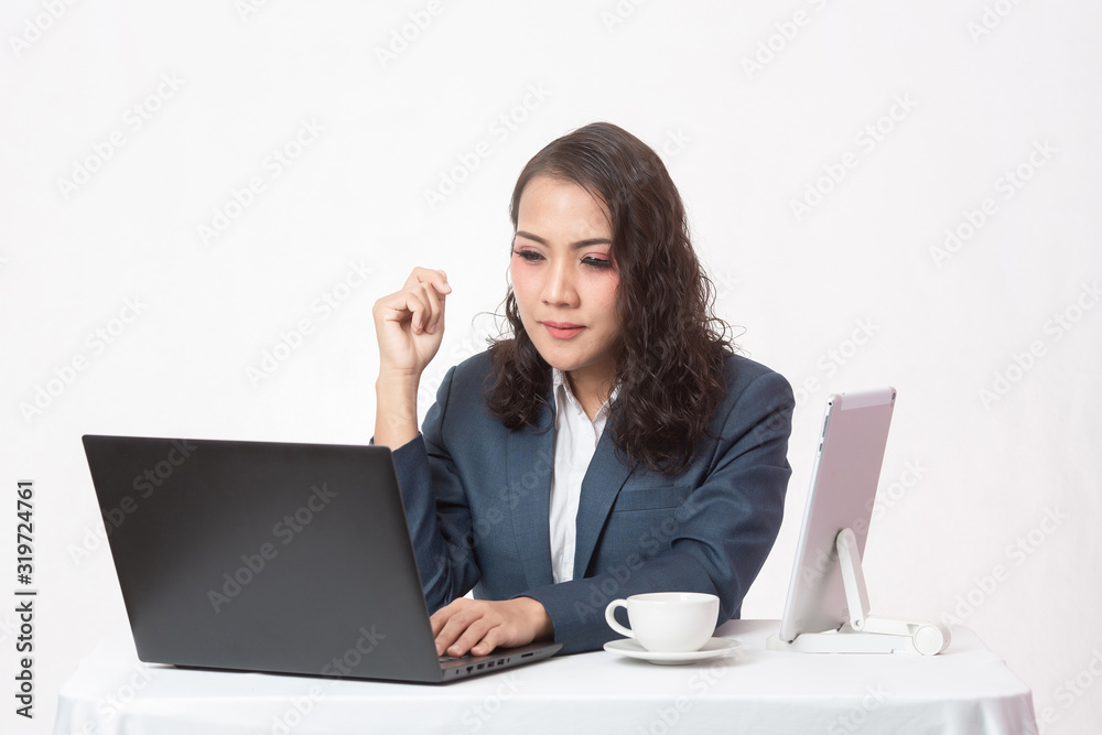 Beautiful young executive with her work and coffee Beautiful young executive with her work and coffee