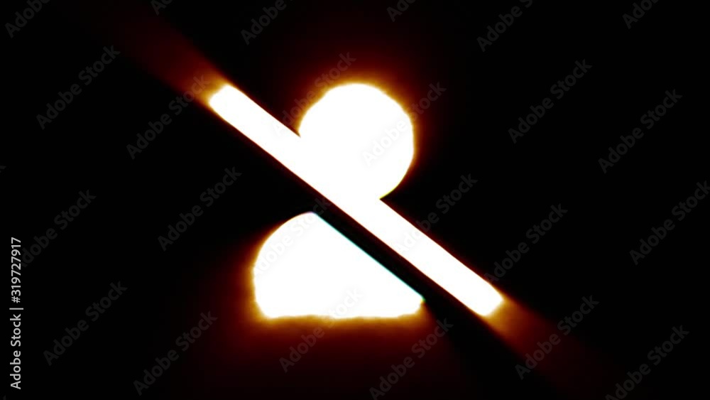 Shiny fire blocked user icon fly in center flickers with rgb spectrum colors and flies away with light trail. Super bright white symbol in motion isolated on black background. 4k 60 fps footage.