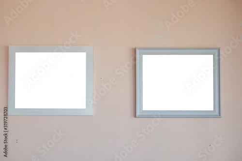 2 empty picture frame on wall background