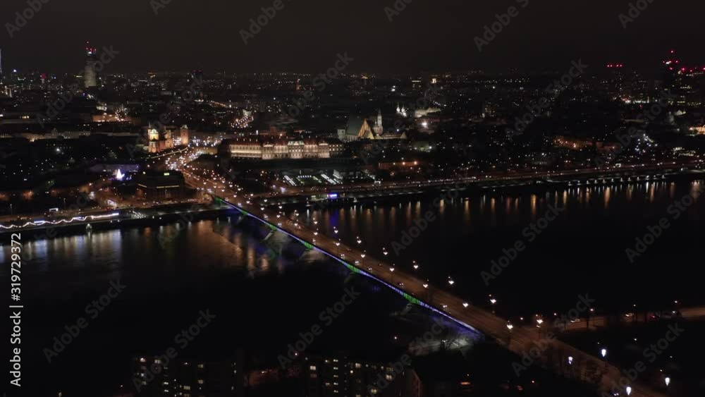 Aerial view of the historic center of the old city in Warsaw, view of the river hung and the bridge at night. Poland. Aerial view of the historic center of the old city in Warsaw, view of the river hung and the bridge at night. Poland.