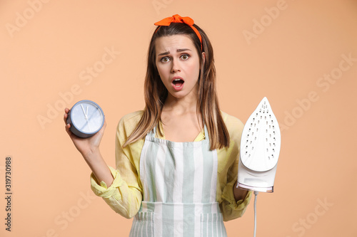 Stressed young housewife wi...
