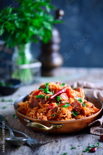 Dominican rice with vegetables and sausages