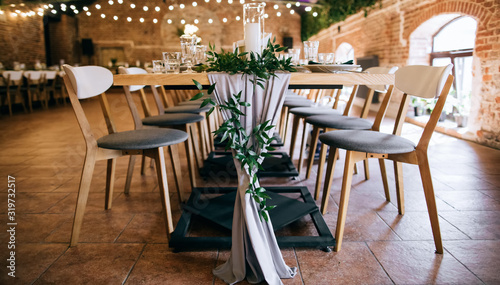 elegant table set, tables and chairs in restaurant © Yevhenii Kukulka