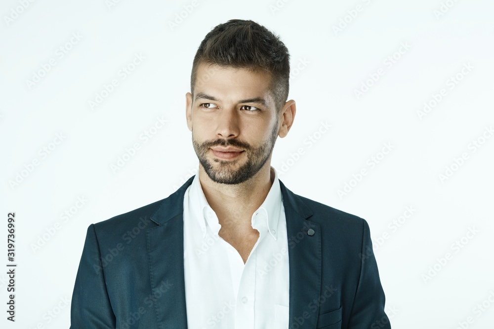 Portrait of smiling businessman in suit Portrait of smiling businessman in suit