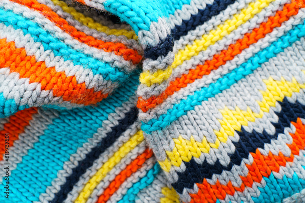 Colorful knit sweater background. Empty copy space background with saturated sweater. Hobby background Colorful knit sweater background. Empty copy space background with saturated sweater. Hobby background