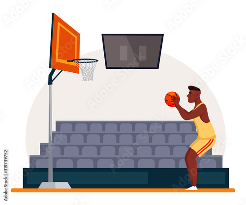 Afro-american player ready throw ball into basket
