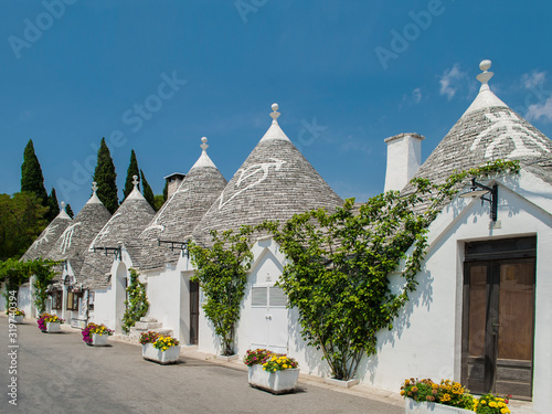 View of the famous Trulli from the streets of Alberobello, Apulia, Italy
