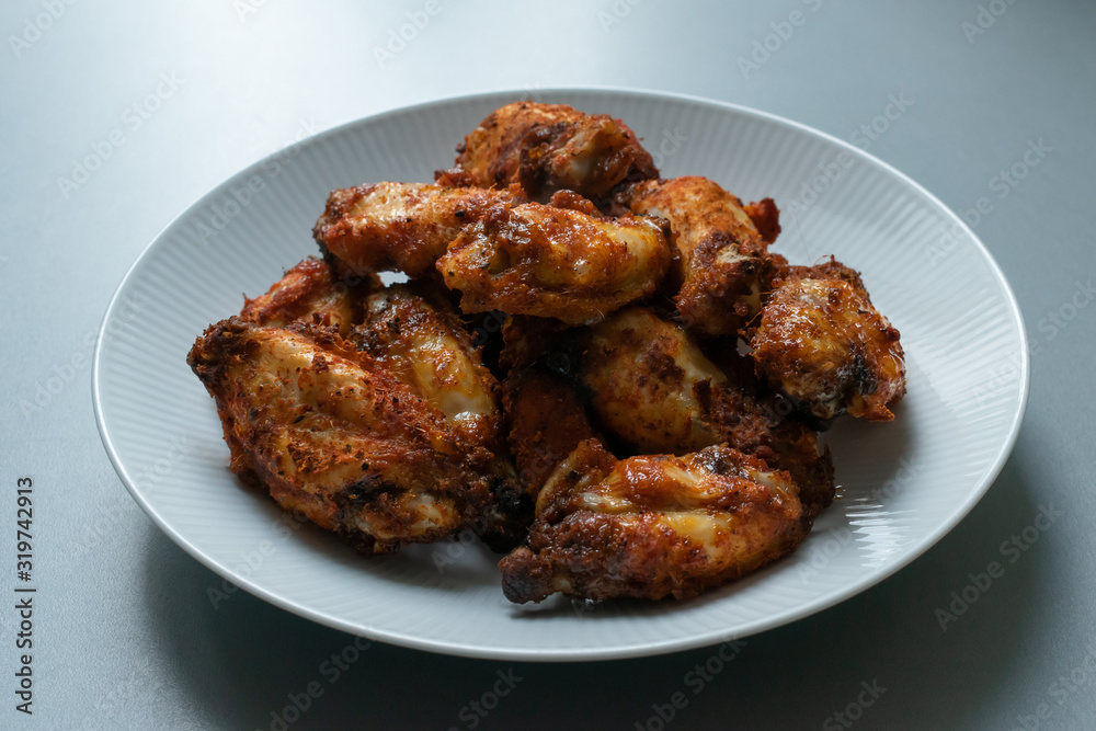 Delicious plate of hot and juicy buffalo chicken wings Delicious plate of hot and juicy buffalo chicken wings