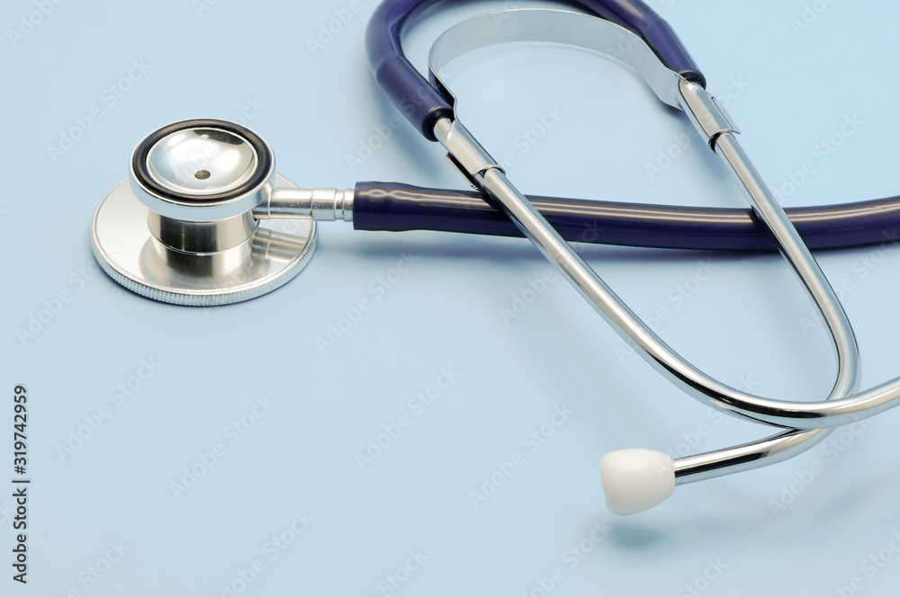 Stethoscope for doctor checkup on light blue background with copy space, healthcare and medical concept. Stethoscope for doctor checkup on light blue background with copy space, healthcare and medical concept.