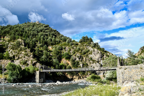 Canvas Print bridge in the mountains, photo as a background , in janovas fiscal sobrarbe , hu