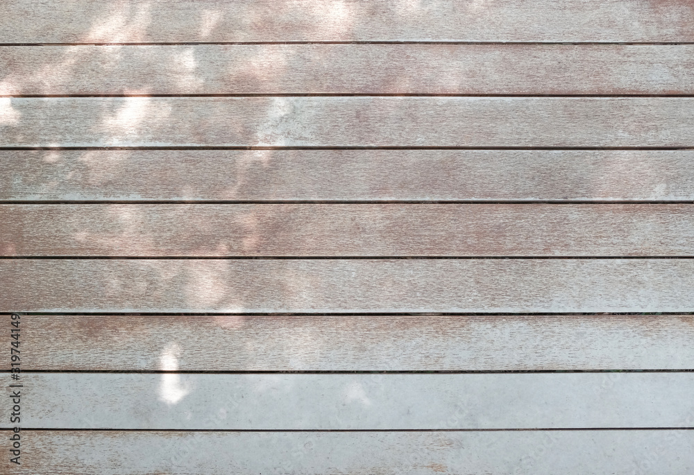 Fototapeta premium Natural wood with sunray shinning pattern textured background for design and decoration, blank for text.