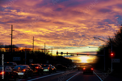 Night traffic, cars on highway road on sunset evening