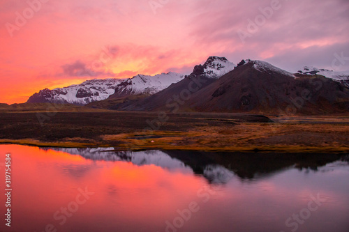 Colorful sunset in front of mountains