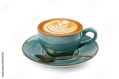 Side view of hot latte coffee with latte art in a vintage ceramic green cup and saucer isolated on white background with clipping path inside. Image stacking techniques.