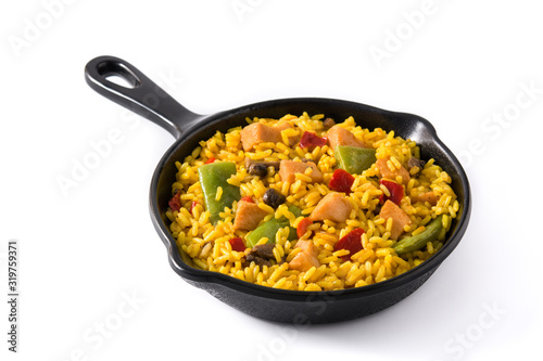 Fried rice with chicken and vegetables in frying pan isolated on white background