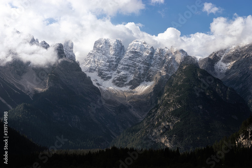 Mountain range with forest in Italian Dolomites.