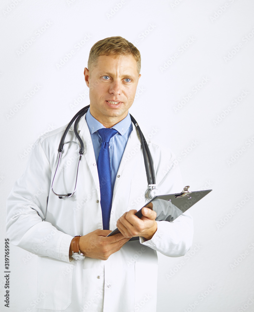 Young confident doctor in a white coat with a stethoscope Young confident doctor in a white coat with a stethoscope