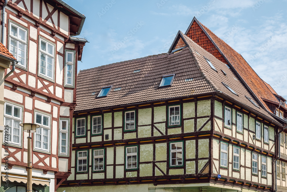 Corner view of the facade of a traditional  half-timbered house. An example of Fachwerk in the medieval city of Quedlinburg, Saxony-Anhalt, Germany. 