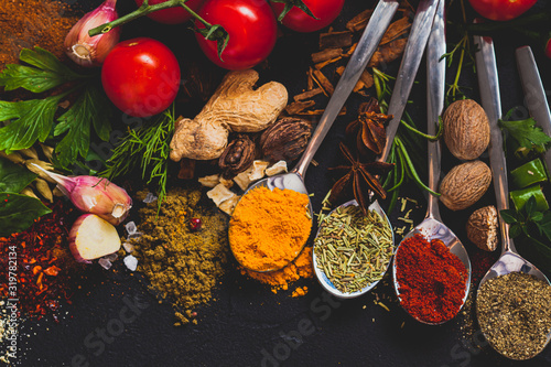 Colorful herbs and spices for cooking, close up