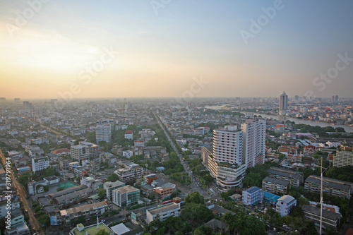 Rooftop views of central Bangkok as the sun sets