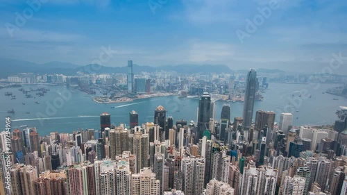 Time-lapse Hong Kong City skyline day time view from Victoria Peak : ZO., Zoom out.