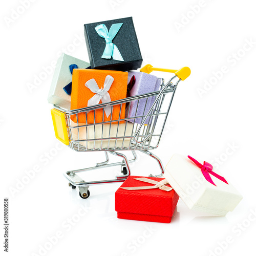 Trolley with gifts on a white background.