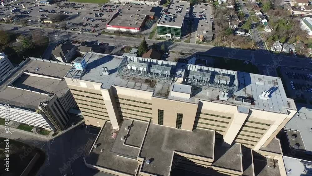 Ascending Aerial Over Hospital Building Structures in Spring Ascending Aerial Over Hospital Building Structures in Spring