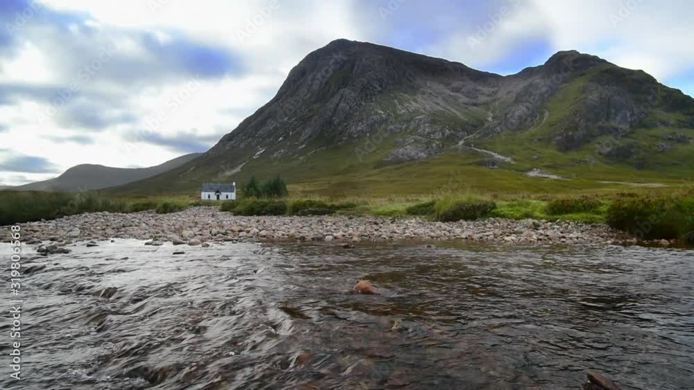 The remote Lagangarbh Hut along River Coupall in front of Buachaille Etive Mor in Glen Coe, Scottish Highlands, Scotland The remote Lagangarbh Hut along River Coupall in front of Buachaille Etive Mor in Glen Coe, Scottish Highlands, Scotland