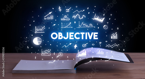 OBJECTIVE inscription coming out from an open book, business concept