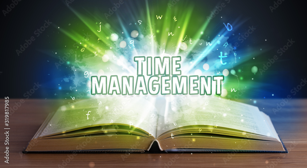 Obraz premium TIME MANAGEMENT inscription coming out from an open book, educational concept