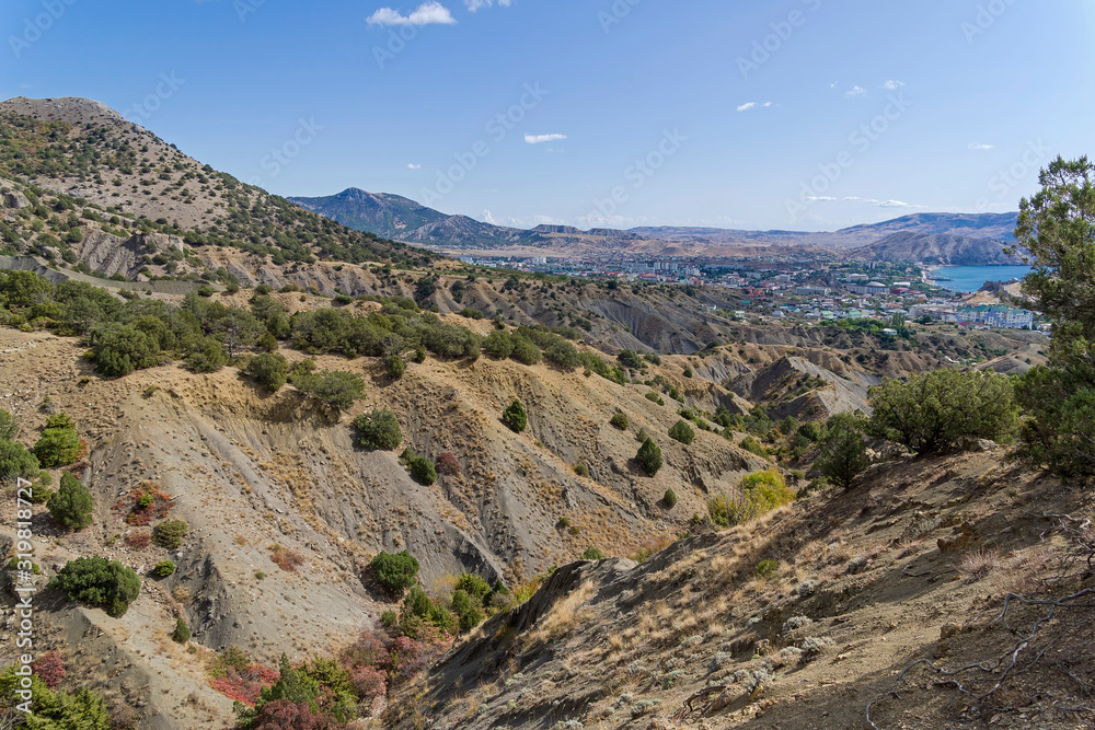 Clay ravines at the foot of the mountains.