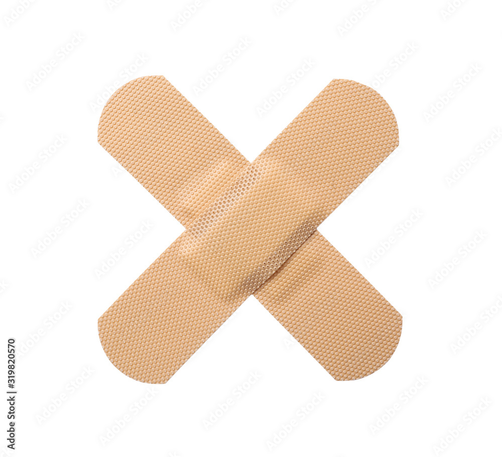 Medical sticking plasters isolated on white. First aid item Medical sticking plasters isolated on white. First aid item