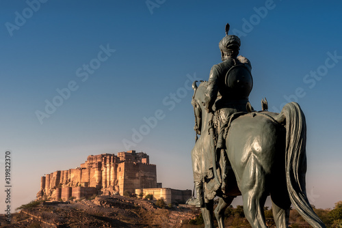Mehrangarh fort in Jodhpur, Rajasthan in India with the statue of  Rao Jodha Ji Statue © sunilpurushe