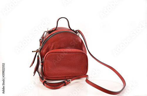 Red leather backpack isolated on white